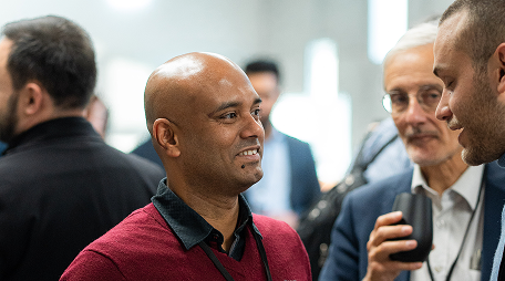 Professionals talking during a networking session